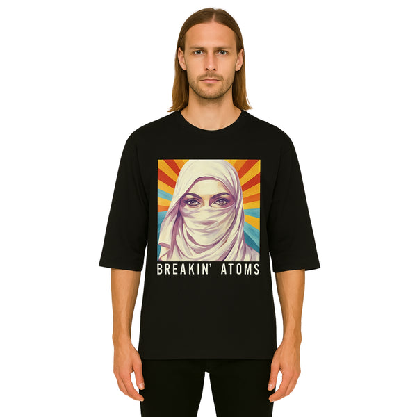 Model wearing Breakin' Atoms "Liberty Spectra T-Shirt," featuring a bold and artistic reimagining of the Statue of Liberty in vibrant tones — blending national symbolism with modern streetwear flair.