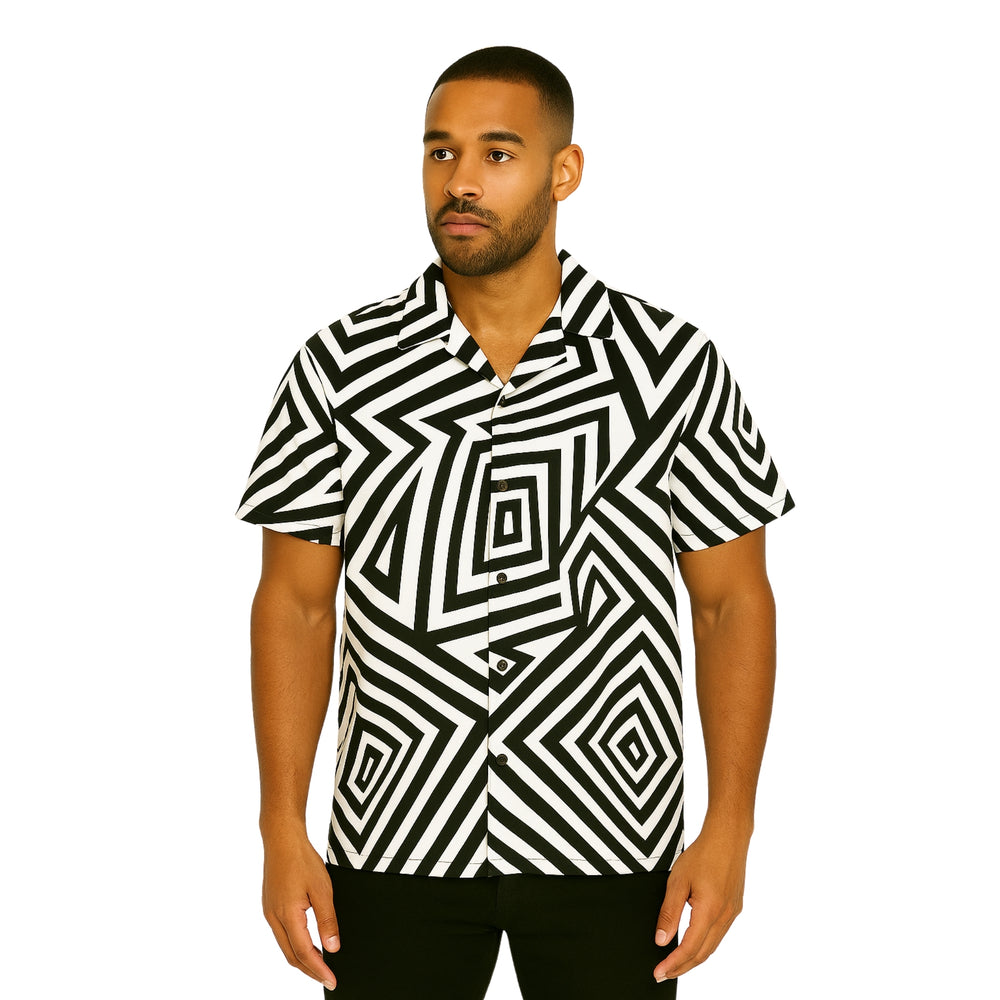 Model wearing Breakin' Atoms "Atomique Vibe Shirt," a short-sleeve dress shirt with bold black and white geometric vortex pattern for a modern — Breakin Atoms premium streetwear