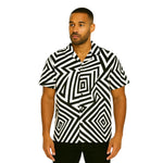 Model wearing Breakin' Atoms "Atomique Vibe Shirt," a short-sleeve dress shirt with bold black and white geometric vortex pattern for a modern thumbnail 1