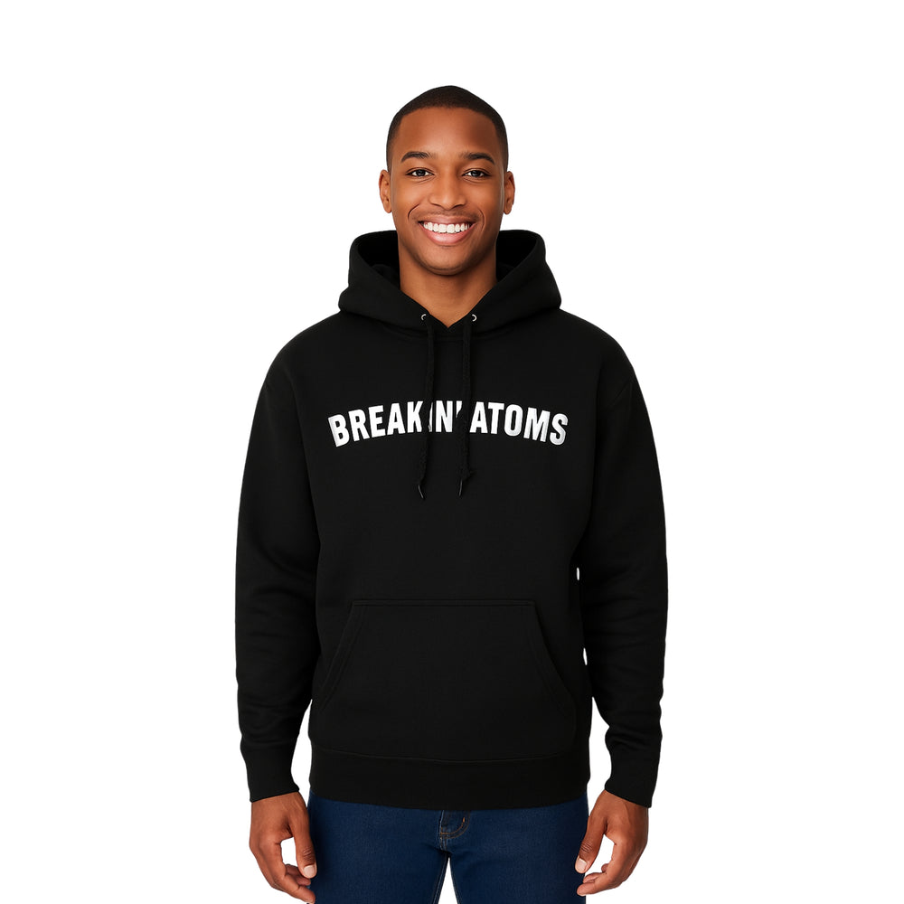 Man in heavyweight Breakin' Atoms pullover hoodie with white front print — Breakin Atoms premium streetwear