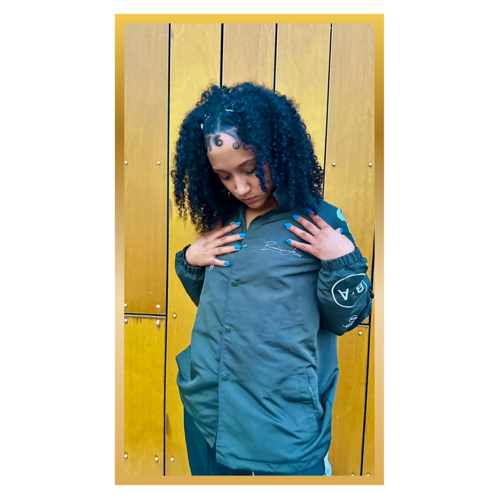 The Break Layer Coach’s Jacket model hands — Breakin Atoms premium streetwear