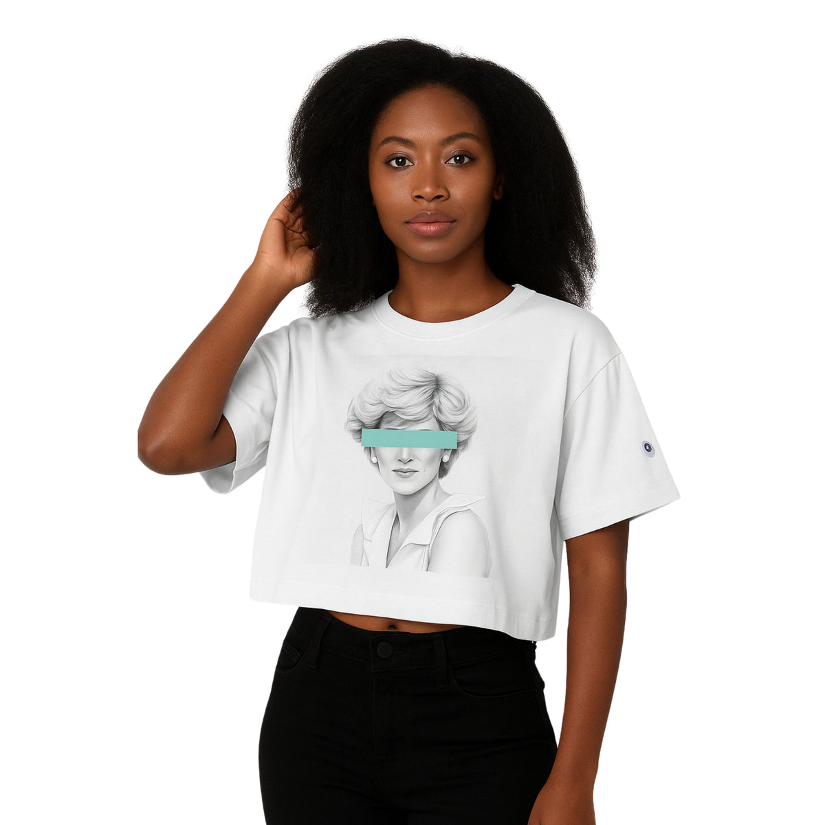 Model wearing Breakin' Atoms "Champion Diana Attitude Tee," a bold graphic t-shirt featuring an iconic image of Princess Diana in sunglasses and athletic gear — blending royal legacy with fearless streetwear energy.