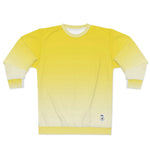 Breakin' Atoms "Canary Yellow Sweater" shown in flat lay, featuring a soft yellow-to-white gradient design, ribbed cuffs and hem, and a minimalist branded patch near the waist. thumbnail 2