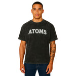 Model wearing Breakin' Atoms "Element Tee – Mineral Wash," a vintage-washed short sleeve t-shirt with a relaxed fit and minimalist front design — perfect for laid-back streetwear styling. thumbnail 1
