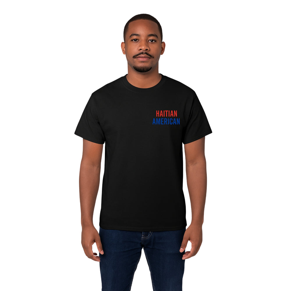 Model wearing Breakin' Atoms "Haitian American Tee," a short sleeve graphic shirt combining the Haitian and American flags in a bold, unified design that celebrates dual heritage and cultural pride. — Breakin Atoms premium streetwear