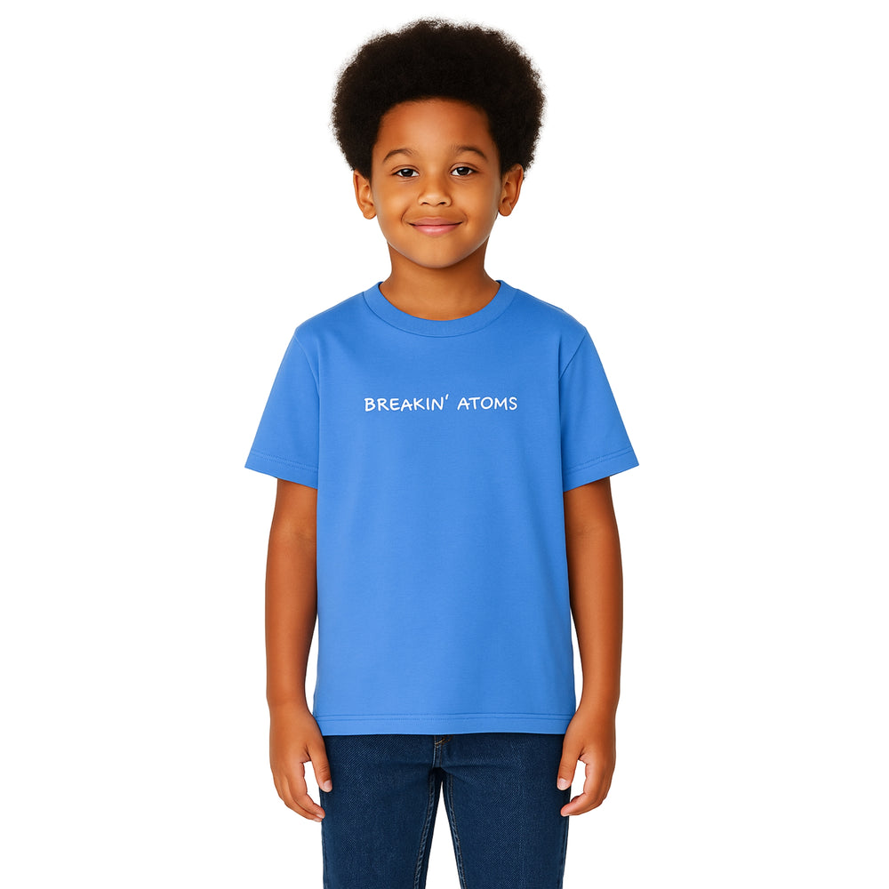 Child wearing the Breakin' Atoms Kids Tee in white, featuring clean Breakin’ Atoms logo print — a soft, versatile everyday shirt designed for active and expressive youth. — Breakin Atoms premium streetwear