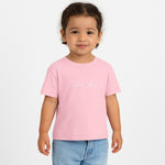 Child wearing Breakin' Atoms "The Little Voyager Tee," a kids’ graphic t-shirt featuring a whimsical space travel design that celebrates curiosity, creativity, and big dreams. thumbnail 6