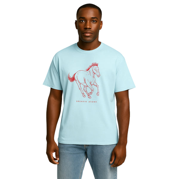 Model wearing Breakin' Atoms "Mustang Spirit Graphic Tee – Freedom Series" in light blue, featuring a red sketch-style mustang in mid-gallop and minimalist Breakin' Atoms logo — a tribute to untamed freedom and movement.