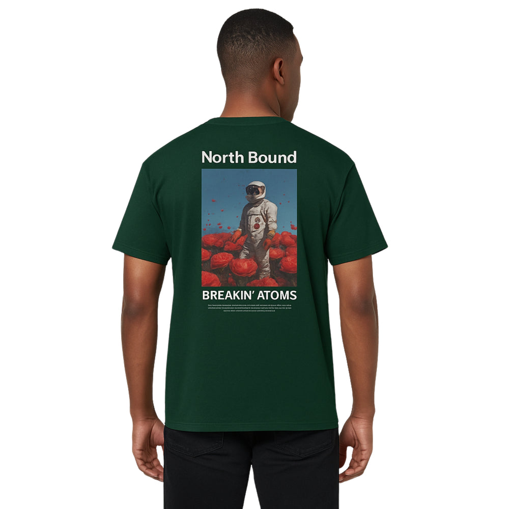 Model wearing Breakin' Atoms "Northbound" T-Shirt, featuring a minimalist yet directional graphic design centered on progress, purpose, and streetwear storytelling. — Breakin Atoms premium streetwear