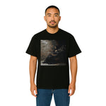 Model wearing Breakin' Atoms "Pixelated Mona Tee," a modern short sleeve t-shirt featuring a pixelated twist on the Mona Lisa — blending classic art with digital-age streetwear flair. thumbnail 1