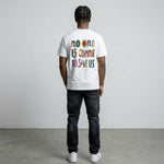 Save your self tee from Breakin' Atoms white graphic t-shirt shown from the back with large colorful no one is coming to save us text print.
 thumbnail 2