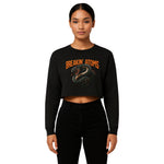 Model wearing Breakin’ Atoms "Serpent Strike Crop Top" — a bold, fitted cropped tee featuring a striking serpent graphic and clean typography, blending mystique, power, and sharp streetwear style. thumbnail 1