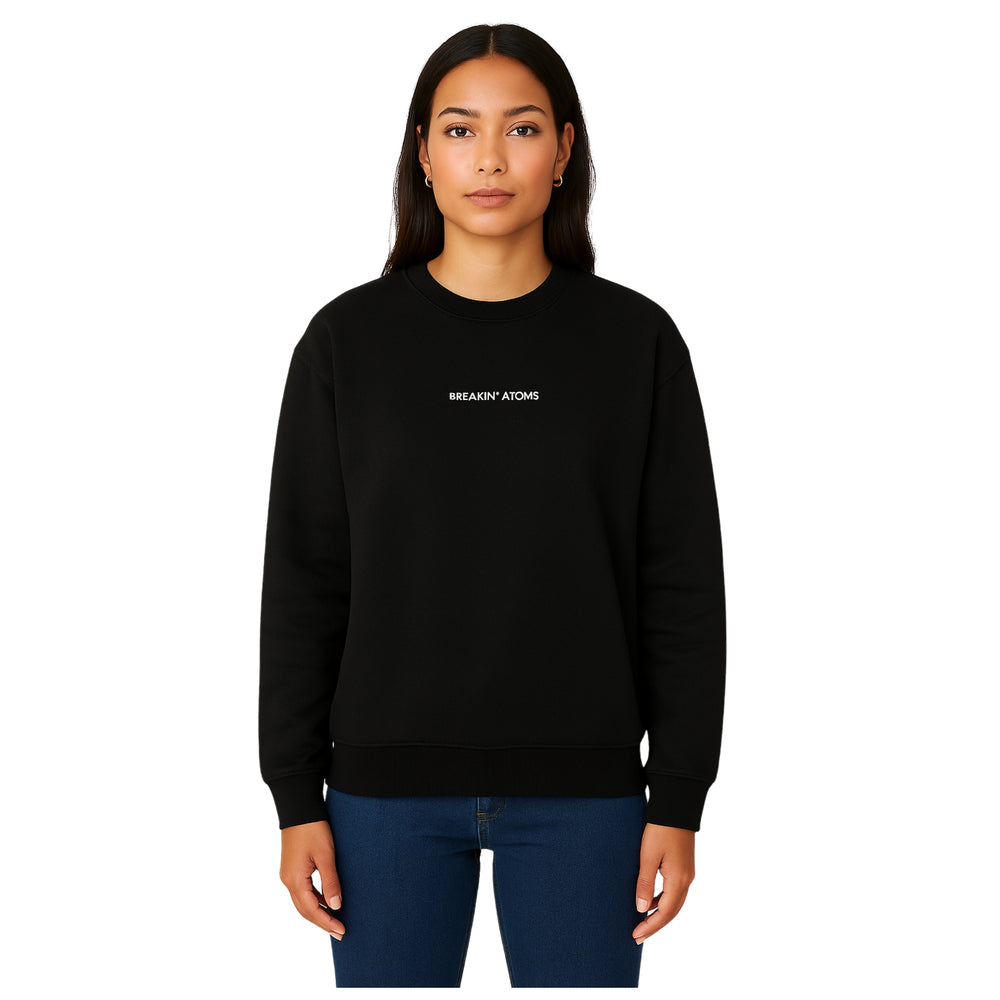 Model wearing Breakin’ Atoms "Silent Motion Crew-Neck Sweatshirt" — a minimalist, soft cotton-blend pullover with understated branding and sleek silhouette, ideal for quiet confidence and subtle streetwear edge. — Breakin Atoms premium streetwear