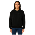 Model wearing Breakin’ Atoms "Silent Motion Crew-Neck Sweatshirt" — a minimalist, soft cotton-blend pullover with understated branding and sleek silhouette, ideal for quiet confidence and subtle streetwear edge. thumbnail 1
