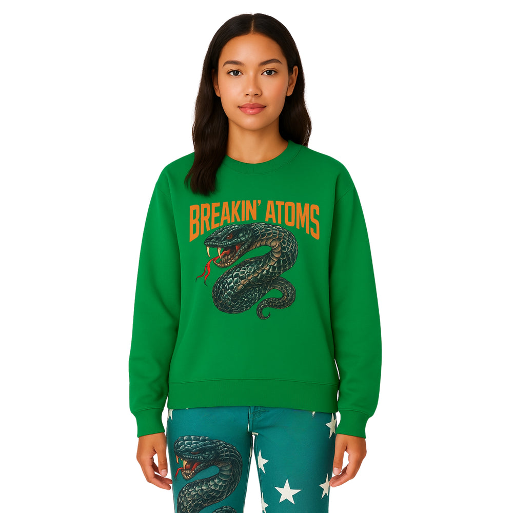 Female model wearing Breakin' Atoms Spring Sweatshirt featuring serpent graphic on pastel tie-dye fabric" — Breakin Atoms premium streetwear