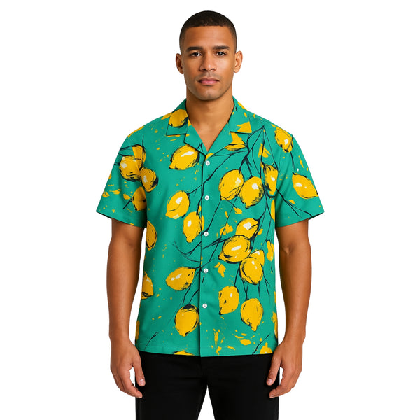 Model wearing Breakin' Atoms "Summer Citrus" shirt, a vibrant short-sleeve button-up featuring a bold lemon print on a bright green background — perfect for tropical getaways.