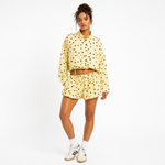 Back view of a Black woman modeling the Breakin' Atoms Yellow Polka Dot Sunday Set thumbnail 7