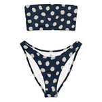 Model wearing Dotti bikini set, front view, featuring navy inkdrop bandeau top and high-leg V-cut bikini bottom. thumbnail 3